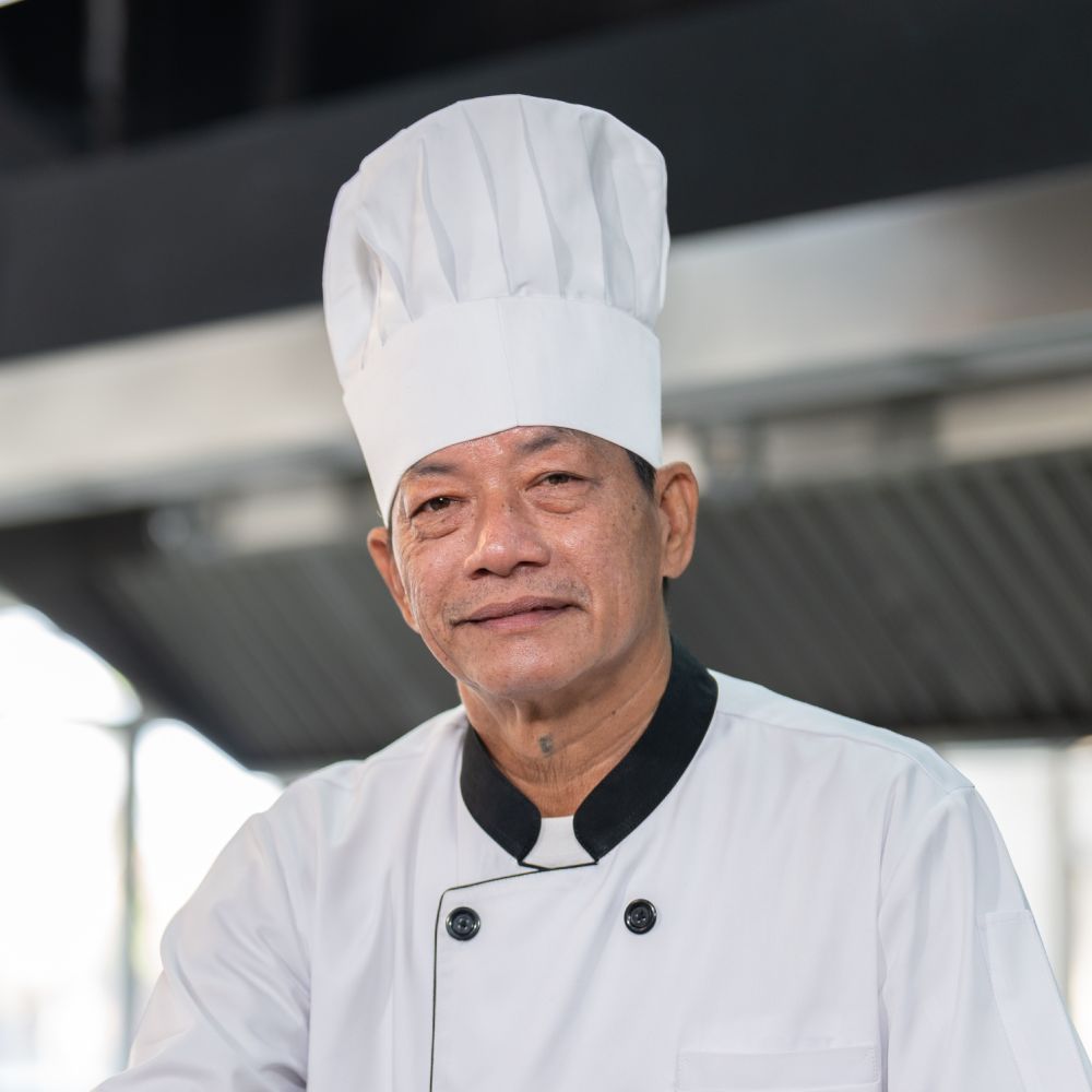 senior asian chef man in dress uniform preparing m kse8j89.jpg