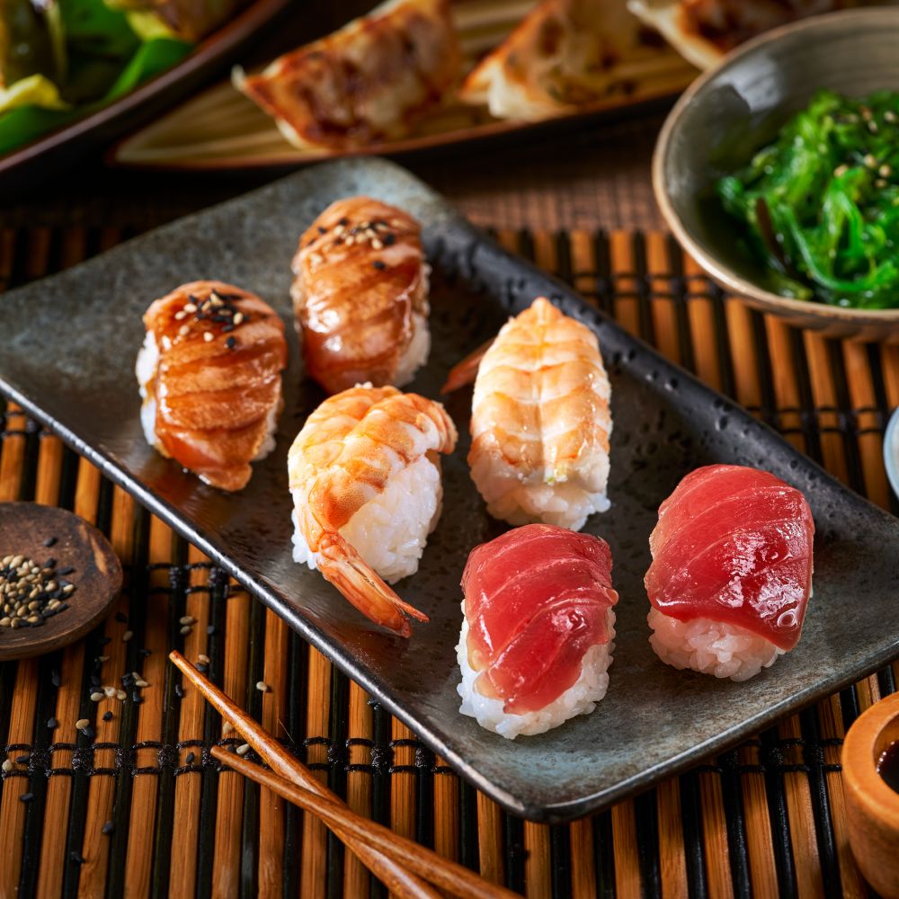 sushi set nigiri gyozas dumplings and wakame salad 92qgckg.jpg